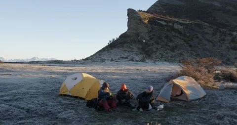 Camping and sharing tea with a view Stock Footage 90405473