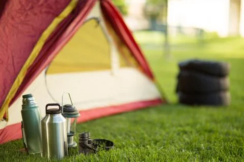 Camping background of a tent with copy space. Stock Photos
