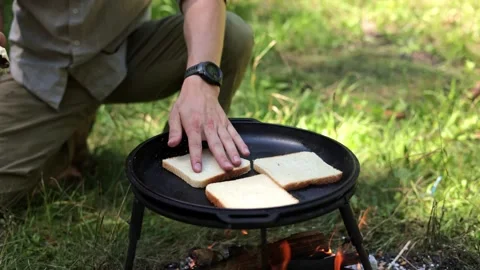 Camping Breakfast Cooking on Open Fire Video stock 280064782