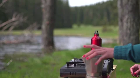 Camping Brewing Coffee 4K Stock Footage 63976921