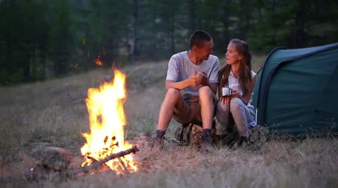 Camping with campfire at night Stock Footage 56280064
