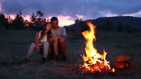 Camping with campfire at night Stock Footage 56280074