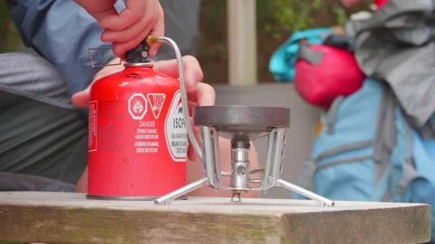 Camping Cooking Setup, Propane Gas Burner Equipment, Outdoor Fire Travel Video stock 171398793