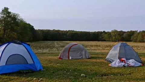 Camping in farmland Stock Footage 147954094