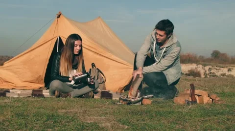 Camping with fire and tent 2 Stock Footage 57526774