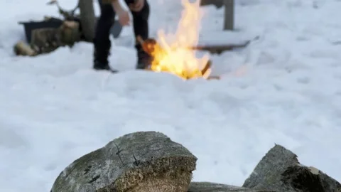 Camping fire in forest winter Stock Footage 233761541