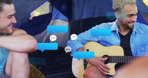 Camping guitarist strumming causing animated digital chat bubbles until woman Stock Footage 312240426