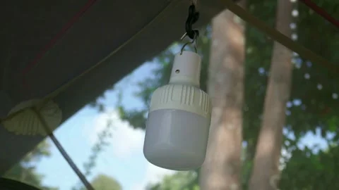 Camping lantern hanging in the tent Stock Footage 293115906