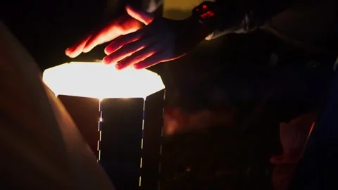 Camping with light from small lantern with bokeh background Stock Footage 310226848