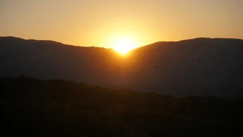 Camping on the mountain at sunset Stock Photos