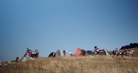 Camping in the mountains motorcycles Video stock 232016002