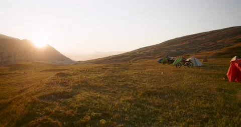 Camping in the mountains motorcycles Video stock 232136597