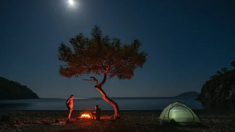 Camping by the sea at night Stock Footage 120448592