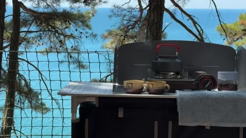 Camping at sea in a pine forest. Stock Footage 282083965