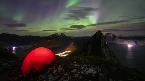 Camping on Senja under the Aurora Borealis Stock Footage 250299265