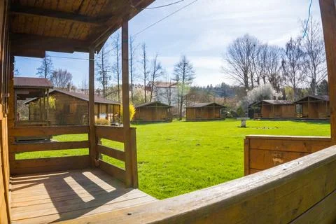 Camping Spring house, row of small wooden huts or houses on green valley. Czech Stock Photos