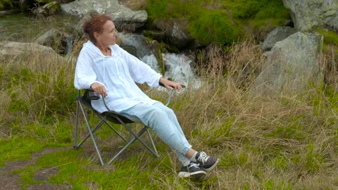 Camping by the stream Stock Footage 301721466