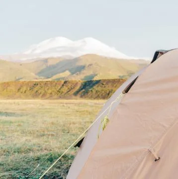 Camping in summer mountains. Stock Photos