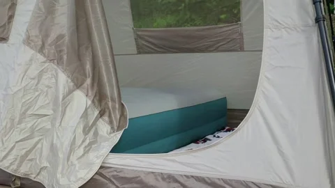 Camping tent with inflatable bed Stock Footage 293427174