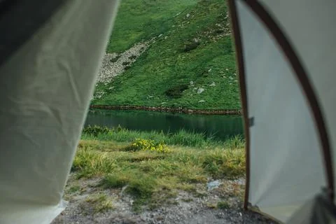 Camping tent, Looking from inside the tent to view outside the mountains an.. Stock Photos