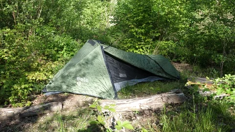 Camping Tent Setup in the Forest Stock Footage 112634759