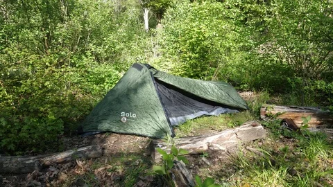 Camping Tent Setup in the Forest Stock Footage 112634786