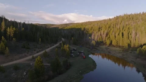 Campsite Reflection Wide Shot | Alpine Lake Sunset Drone Vídeos de archivo 331551813