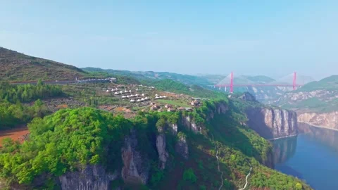 A campsite on a steep cliff Stock Footage 311537316