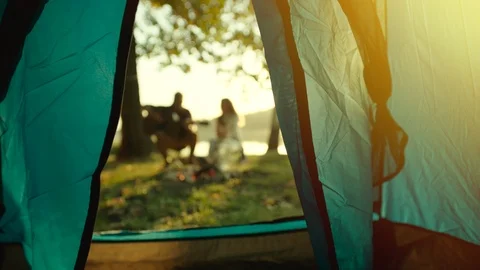Campsite view from the tent at sunset Stock Footage 98676382