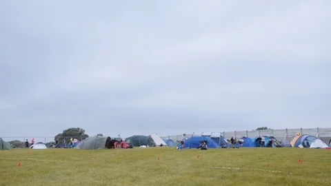 Campsite wide, cloudy day Stockbeeldmateriaal 126986007