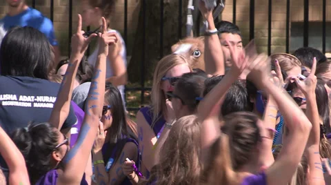 Campus life with students celebrating school orientation week Stock Footage 36571064