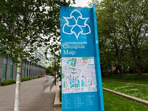 Campus map sign on a university walkway in Manchester UK showing campus lay.. Stock Photos