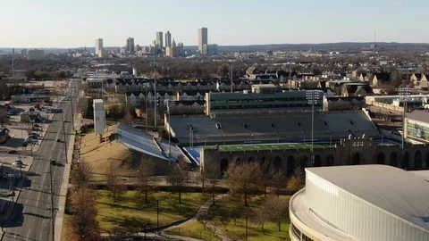 Campus stadium beside a broad Tulsa Oklahoma avenue 库存影片 121109782