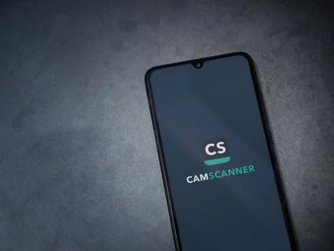 CamScanner app launch screen with logo on the display of a black mobile smart Stock Photos
