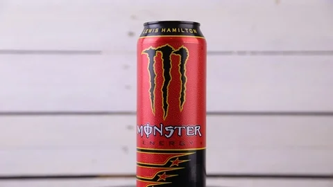 Can of energy drink monster edition lewis hamilton Stock Footage