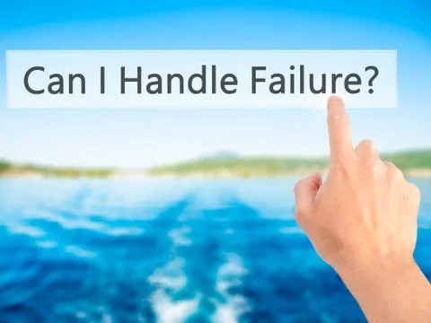 Can I Handle Failure? - Hand pressing a button on blurred background concept  Photos