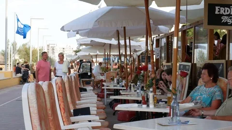 Can Picafort Mallorca Spain: Elderly couple having a drink on a terras Video stock 81049560