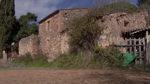 Can Robert derelict facade front gimbal La Mola fir tree traveling Stock Footage 320547528