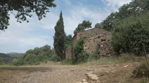 Can Robert old stone house gimbal traveling stabilized rural Stock Footage 321874029