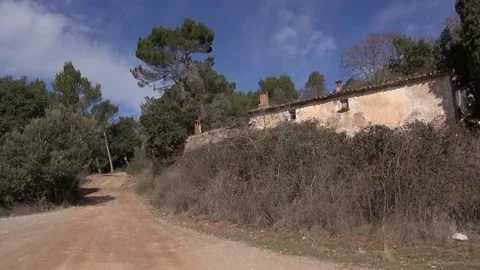 Can Robert road dirt path stone old gimbal La Mola traveling Stock Footage 320547567
