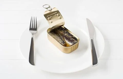 Can of sardines served on the table Stock Photos