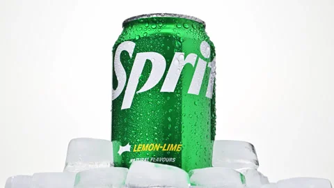 A can of Sprite with ice cubes on top of it Stock Footage 327296415