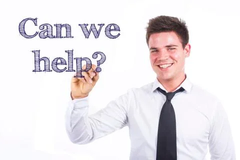 Can we help? - Young smiling businessman writing on transparent surface Stock Photos