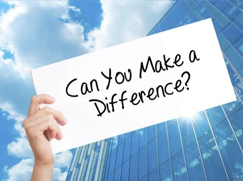 Can You Make a Difference? Sign on white paper. Man Hand Holding Paper with t 스톡 사진