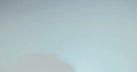 Canabis flowers falling on reflective surface in slow motion Stock Footage 65167145