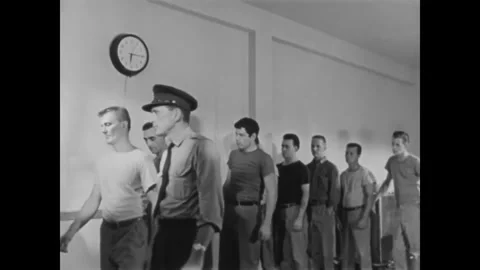 CANADA - 1965 - Prisoners play baseball in the yard. Stock Footage 340649598