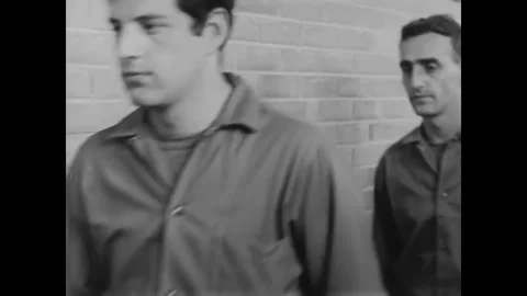 CANADA - 1965 - Two inmates working in the prison's woodshop wonder how they Stock Footage 340649528