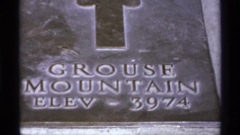 CANADA-1974: Grouse Mountain Elevation Marker And Summit Panoramic View Stock Footage 125630963