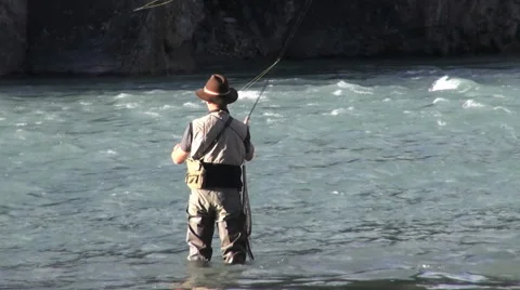 Canada Alberta Banff Bow River fisherman casts into rapids 8 Stock-Footage 40600369