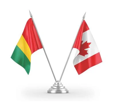 Canada and Guinea table flags isolated on white 3D rendering Stock Illustration